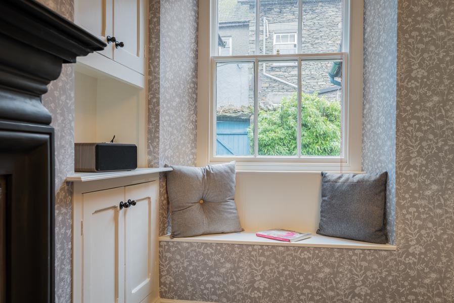 Cushioned window seat in the dining room